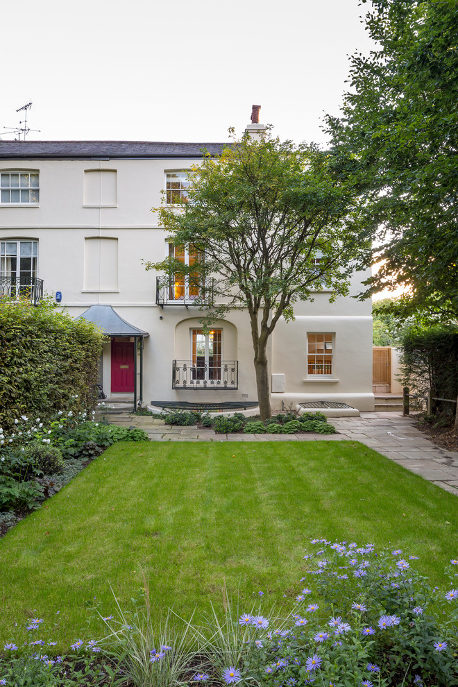 Design ideas for a medium sized traditional front garden in London.