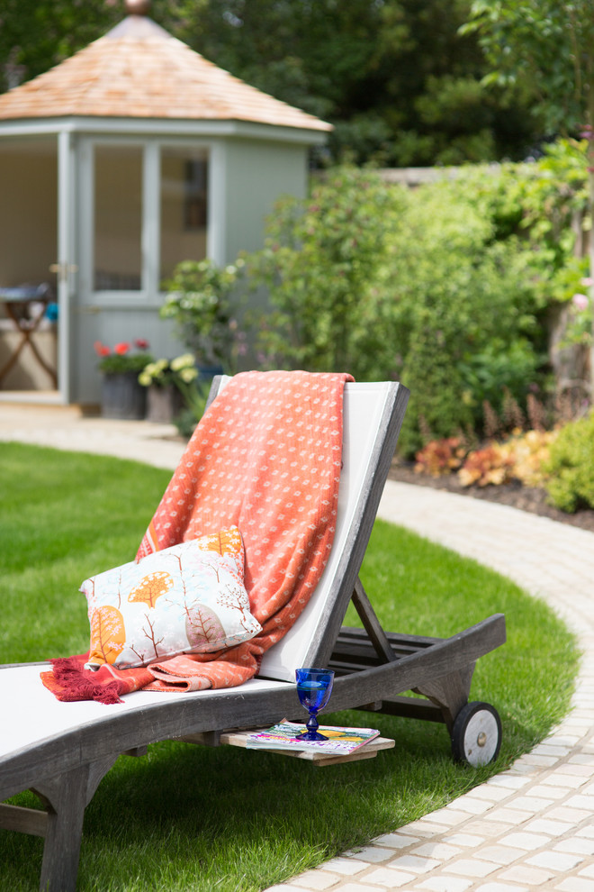 Photo of a medium sized mediterranean courtyard partial sun garden in Cheshire.