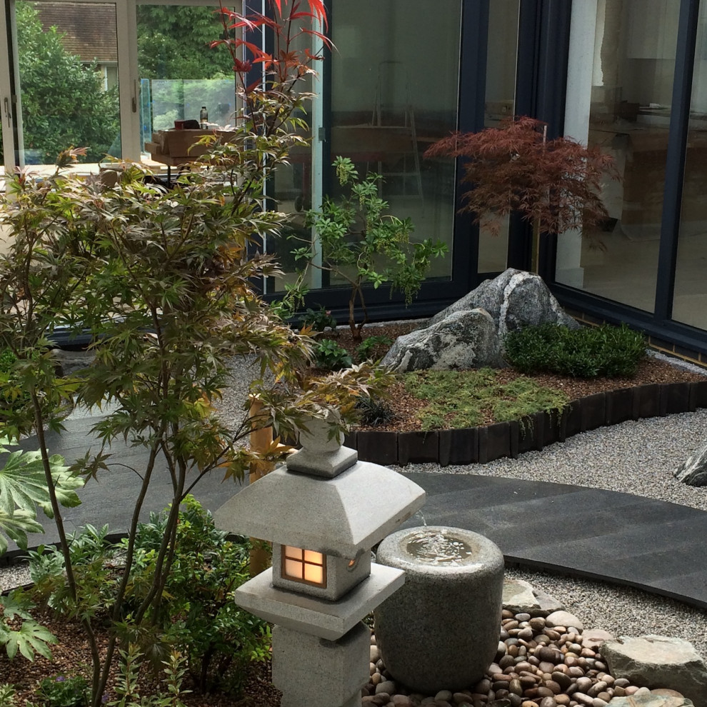 На фото: японский сад в современном стиле с