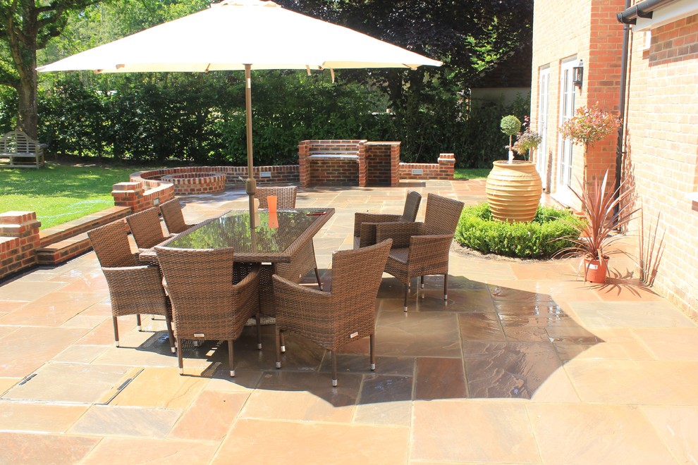 Inspiration for a contemporary patio in Surrey.
