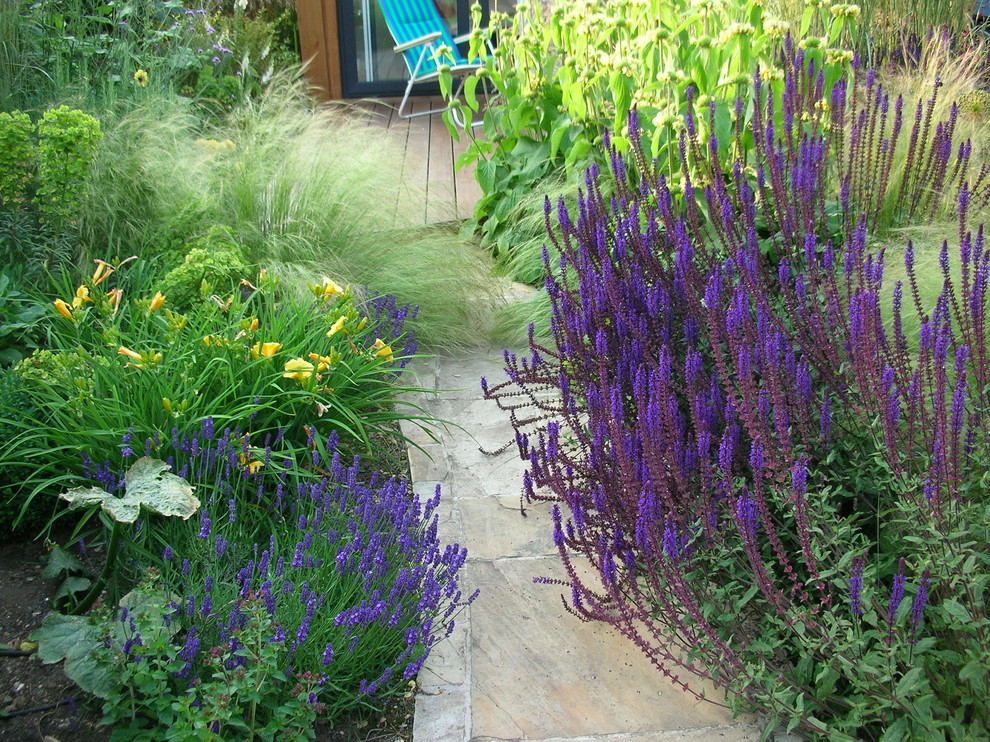 Inspiration for a contemporary back garden for summer in London with decking.