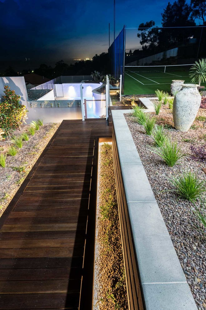 Inspiration for a large contemporary front yard landscaping in Adelaide.