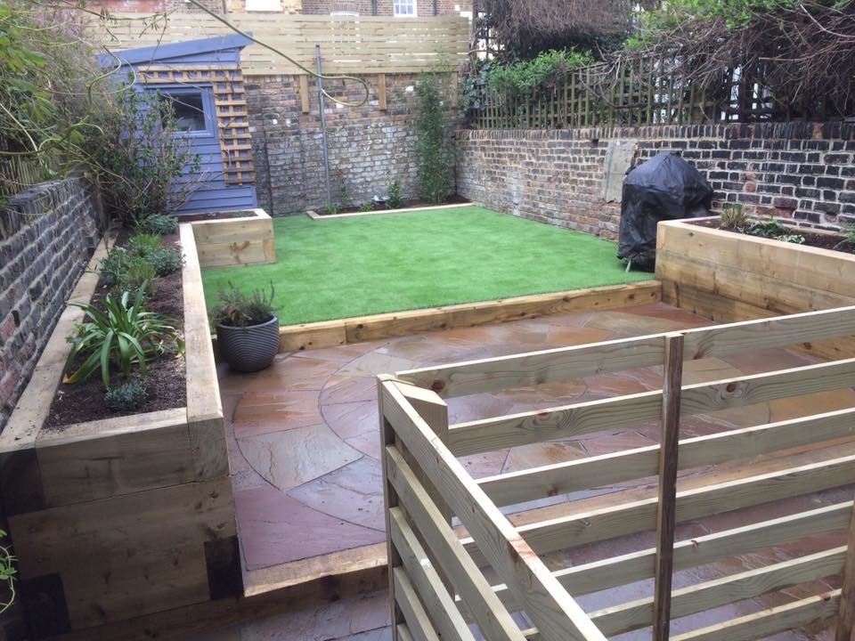 Photo of a small modern partial sun backyard formal garden in London for summer.
