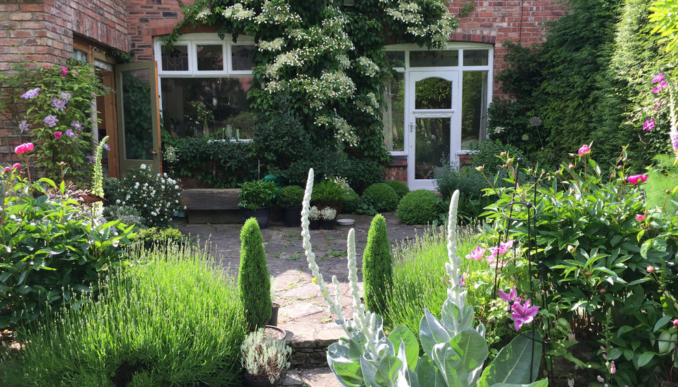 Photo of a contemporary garden in Cheshire.