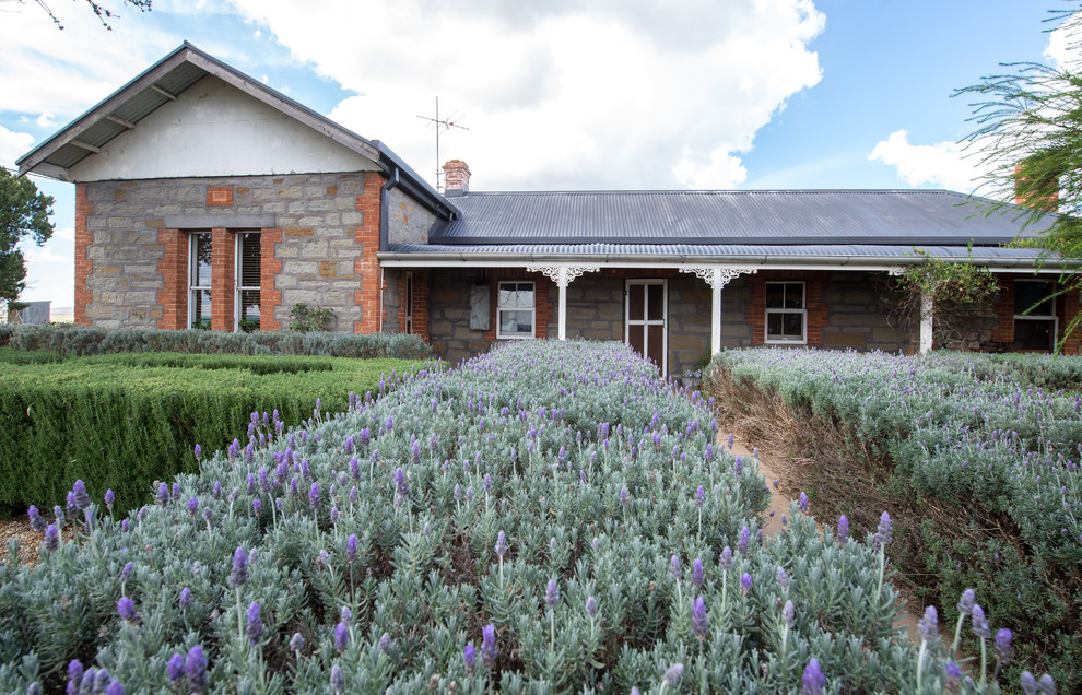 This is an example of a farmhouse landscaping in Adelaide.