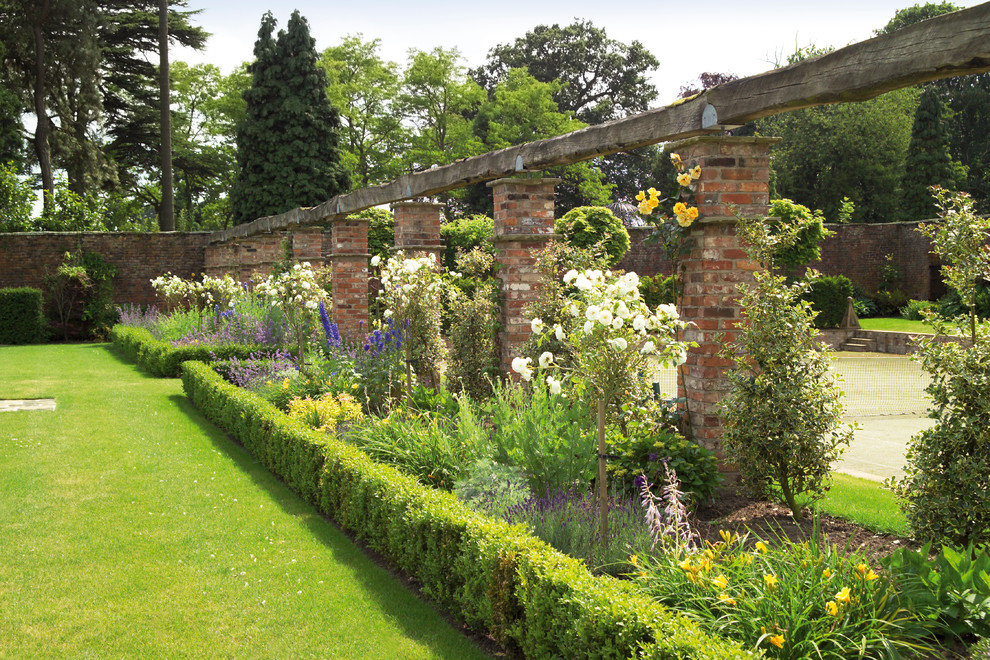 Design ideas for a classic formal full sun garden in Cheshire.