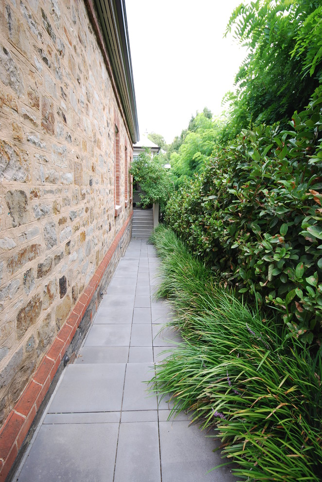 Photo of a large modern back garden for summer in Adelaide with decking.