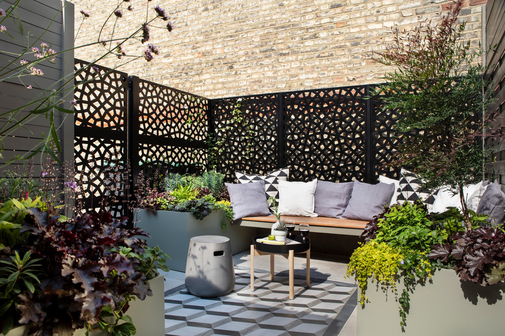 This is an example of a small contemporary landscaping in London.