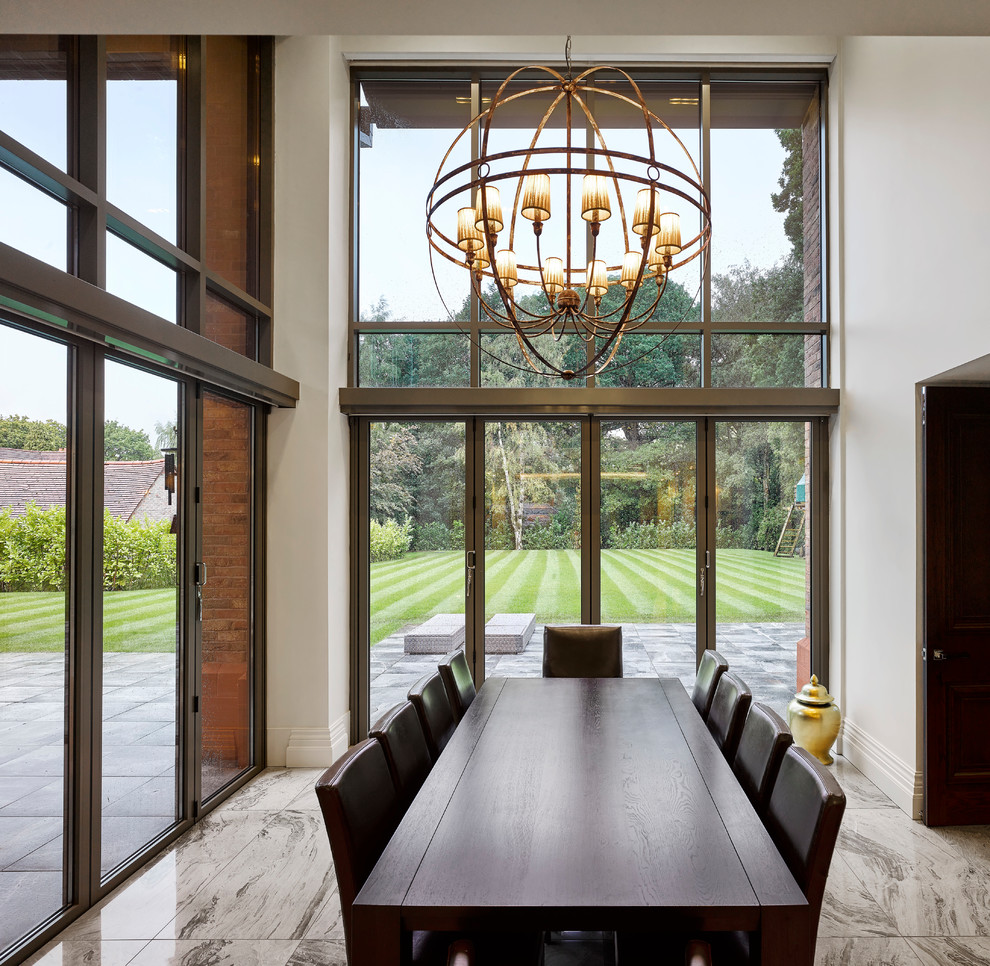 Design ideas for an expansive modern dining room in Cheshire.