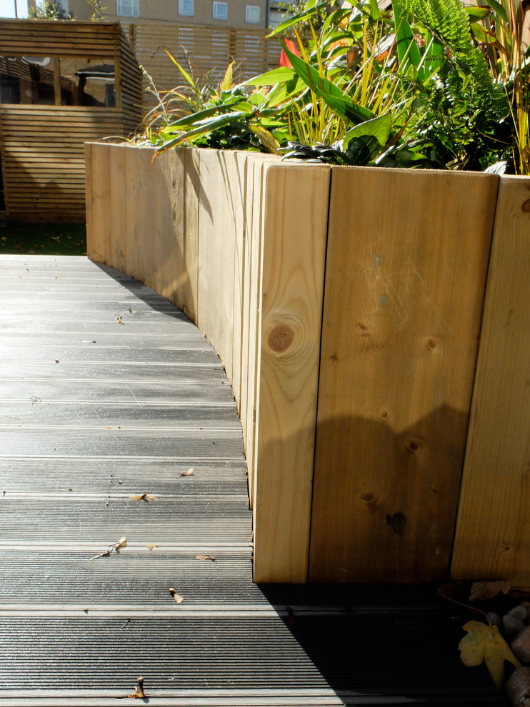 Railway sleepers laid vertically for cost effective raised beds
