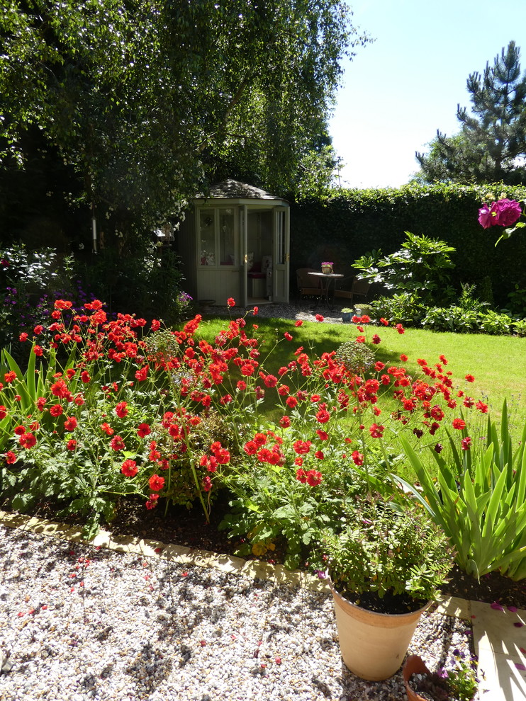 Inspiration for a medium sized contemporary back full sun garden in Cheshire.