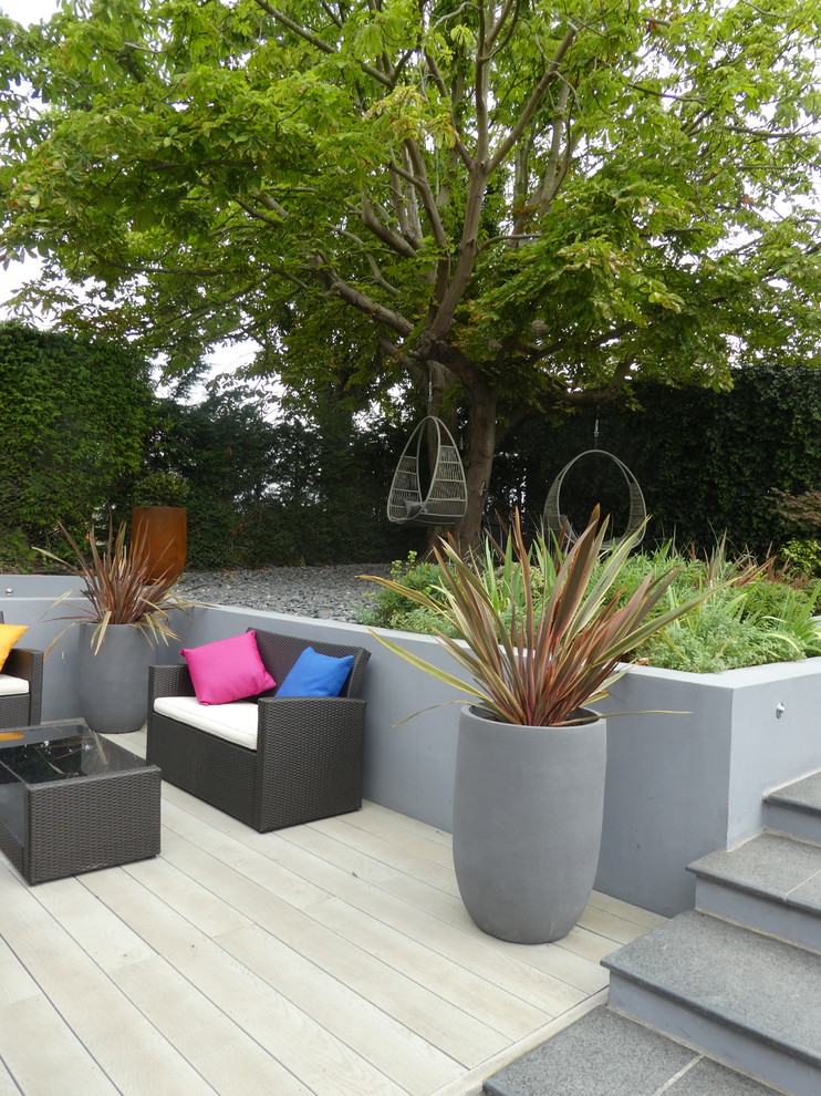 Design ideas for a large contemporary back garden in Cheshire.