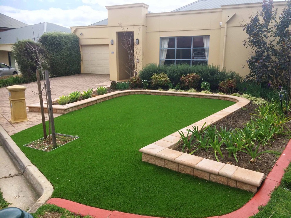This is an example of a front formal garden in Melbourne.