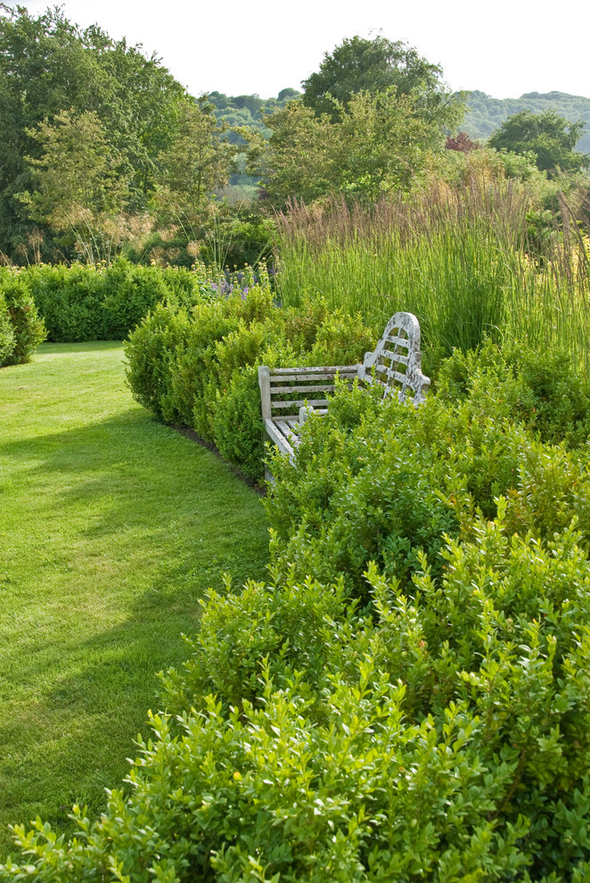 Inspiration for a large farmhouse back full sun garden for summer in Sussex.