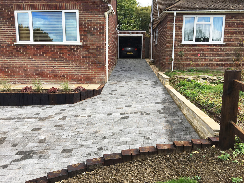 Design ideas for a large contemporary full sun brick landscaping in Oxfordshire.