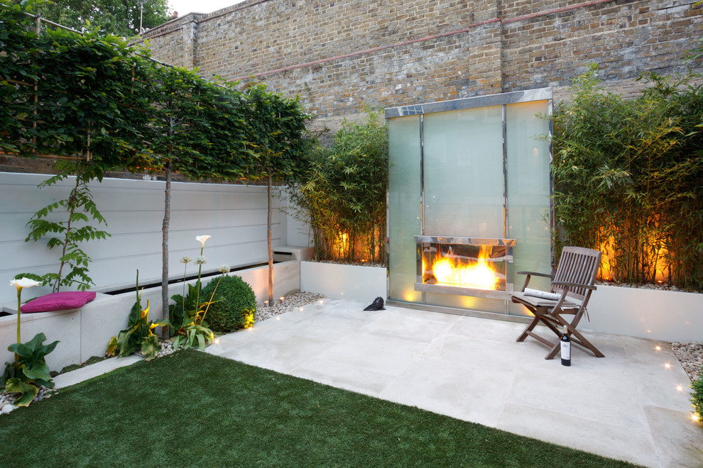 Photo of a contemporary backyard landscaping in London.