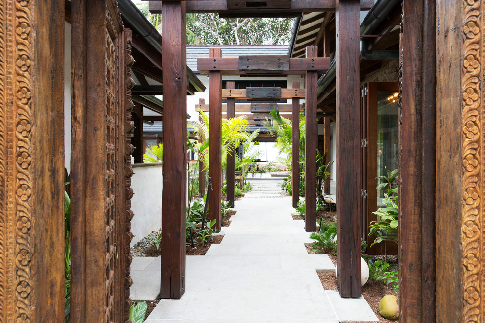 Design ideas for a world-inspired courtyard garden in Cairns.