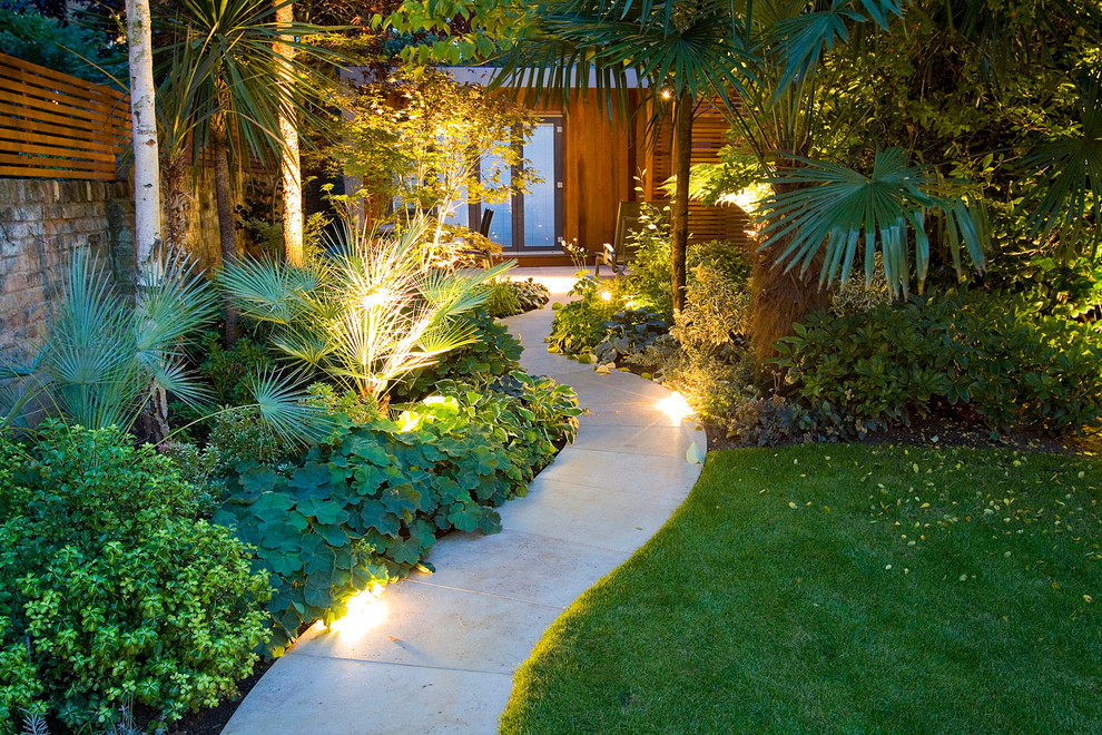 Inspiration for a world-inspired back garden in London with a garden path and concrete paving.