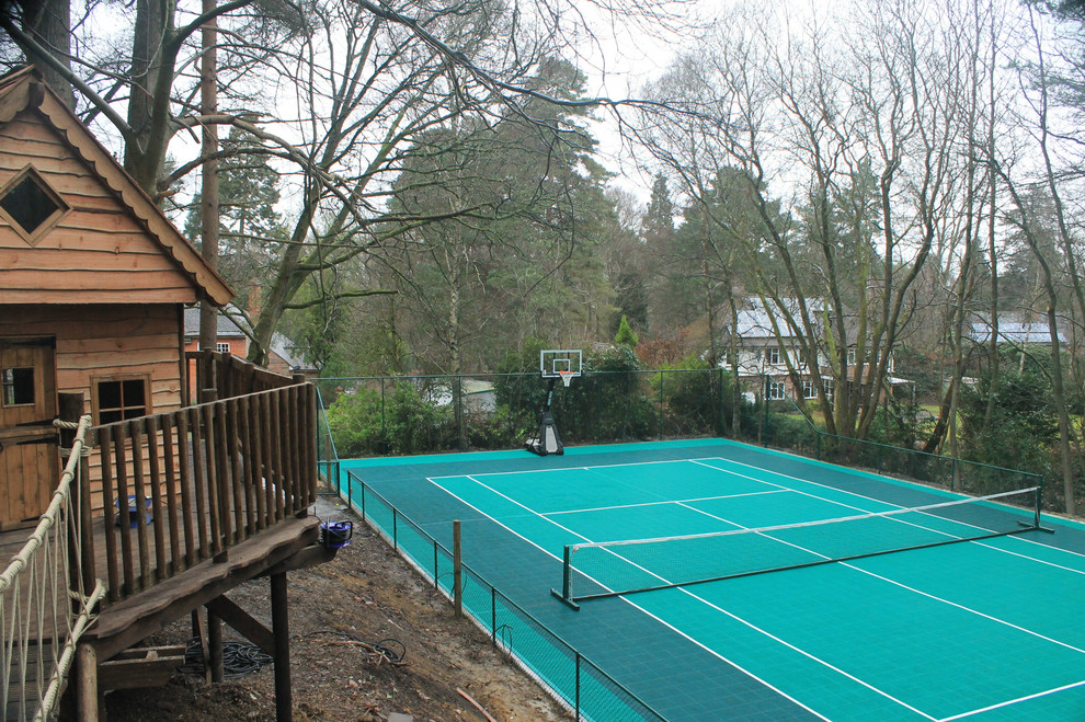 Design ideas for a large back private garden in Hampshire with an outdoor sport court.
