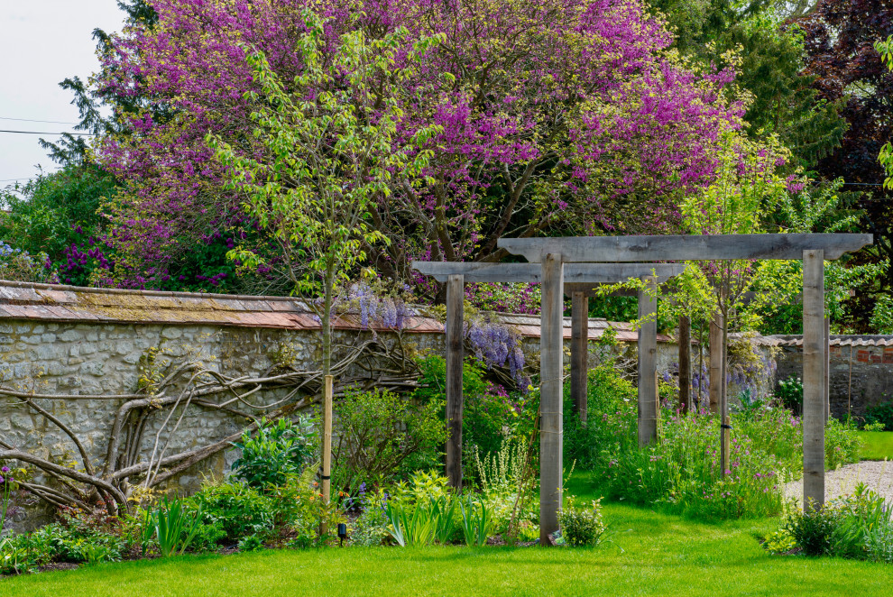 Foto di un privacy in giardino mediterraneo esposto in pieno sole di medie dimensioni e dietro casa