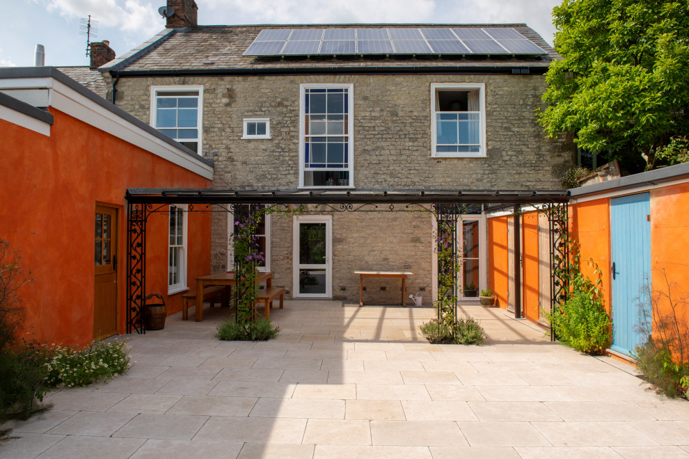 Design ideas for a medium sized mediterranean courtyard private full sun garden in Wiltshire.