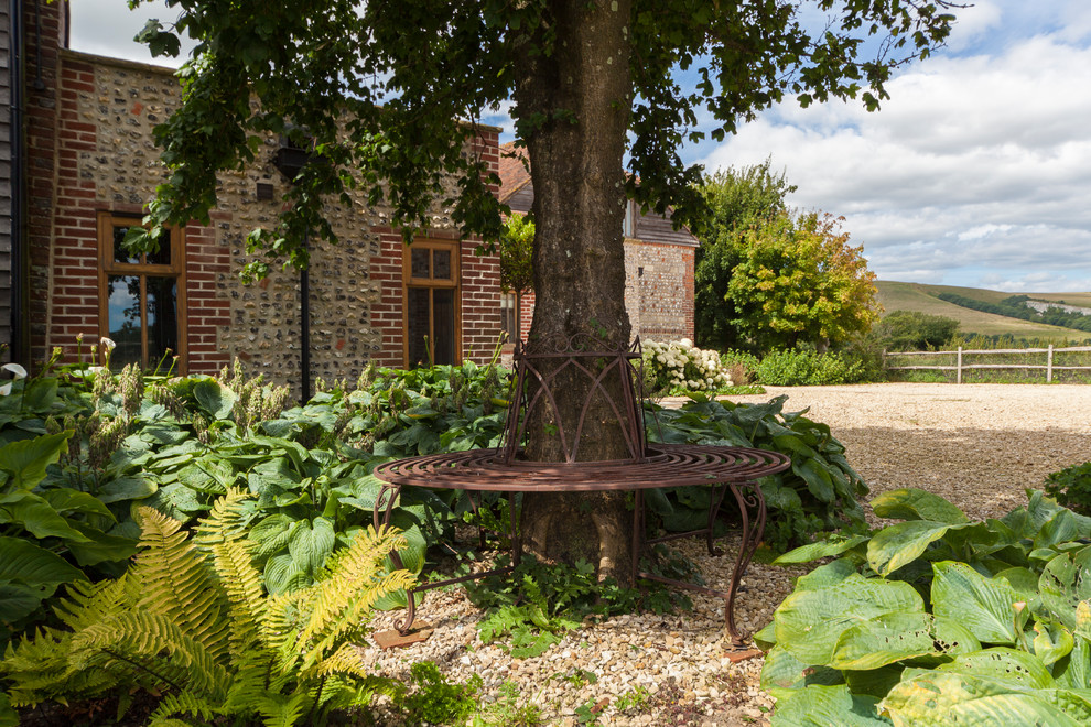 This is an example of a farmhouse landscaping in Sussex.