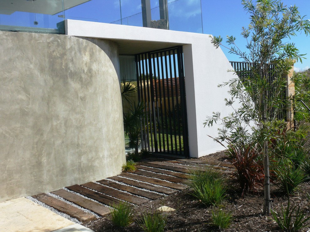 This is an example of a contemporary garden in Perth.