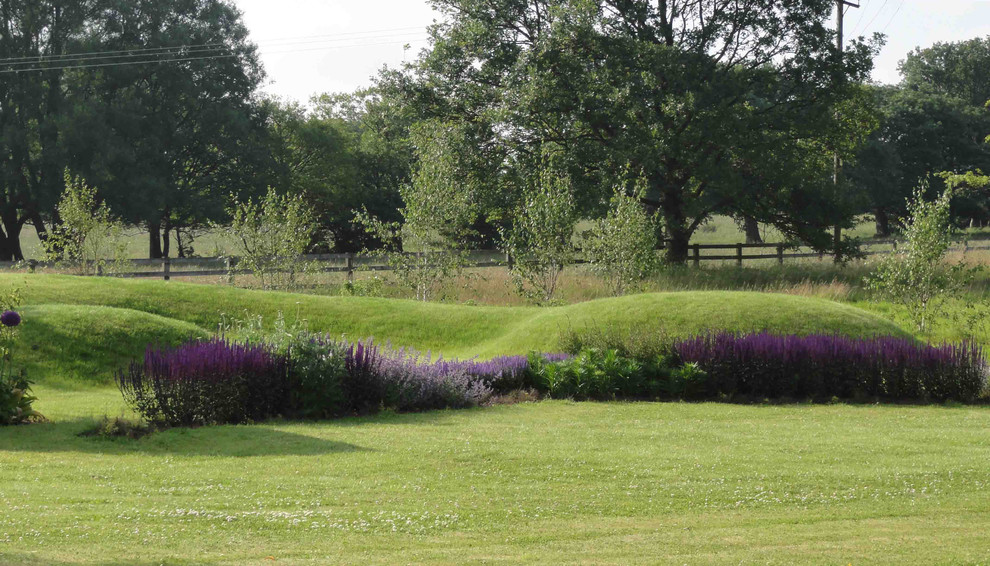 This is an example of a contemporary garden in Cheshire.