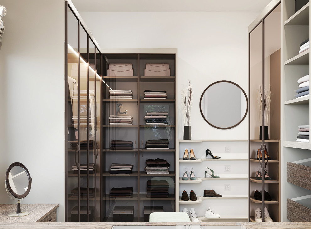 Inspiration for a mid-sized contemporary porcelain tile and beige floor walk-in closet remodel in Other