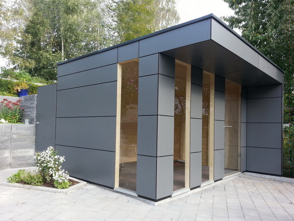 Inspiration for a mid-sized contemporary detached garden shed remodel in Cologne