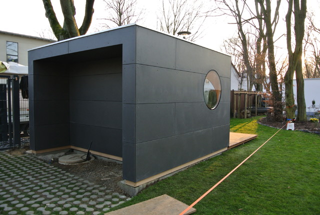 Gartenkubus mit Terrasse und Holzablagemöglichkeit Contemporary