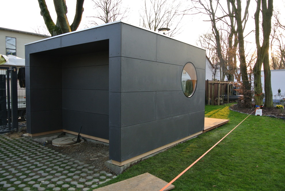 Mid-sized trendy detached studio / workshop shed photo in Munich