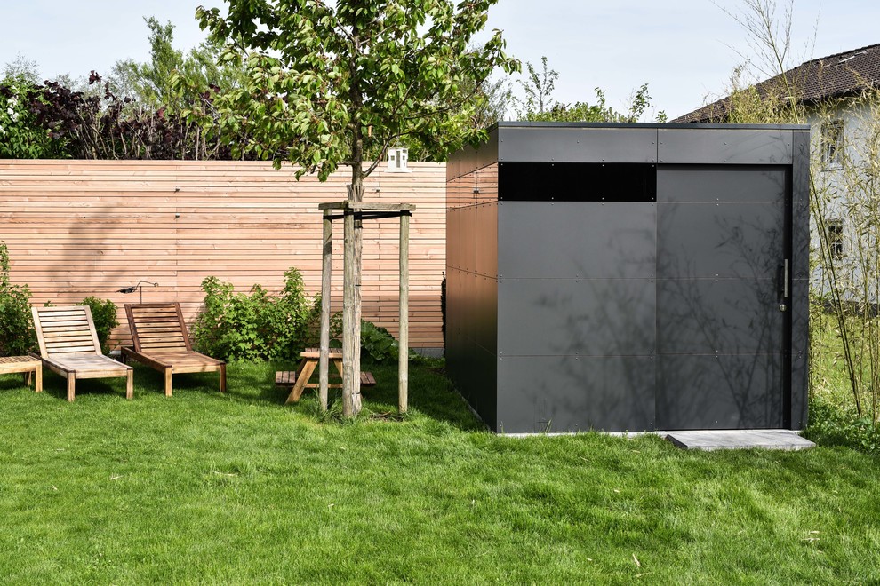 Cette photo montre un petit abri de jardin séparé moderne.