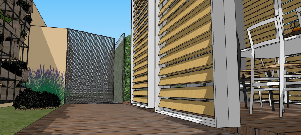 Photo of a medium sized contemporary front full sun garden in Milan with decking.