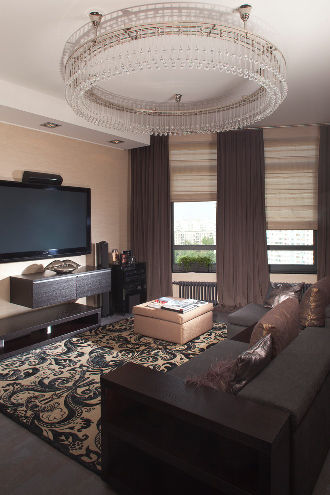 Esempio di un soggiorno contemporaneo di medie dimensioni e aperto con pareti beige e TV a parete
