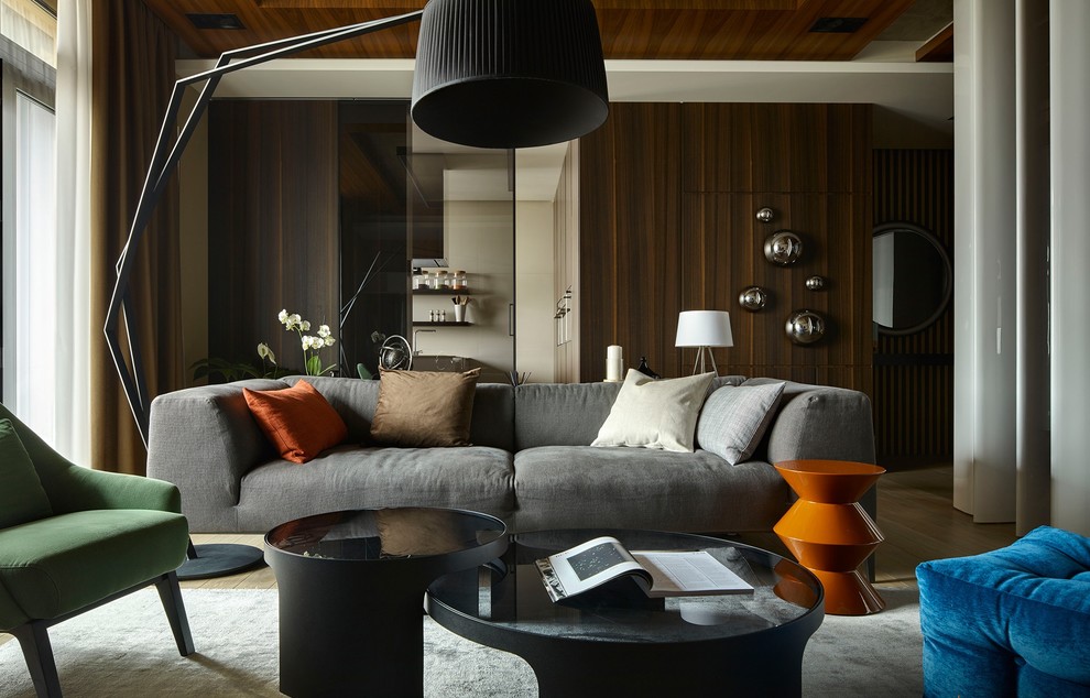 Idee per un soggiorno contemporaneo chiuso con pavimento in legno massello medio