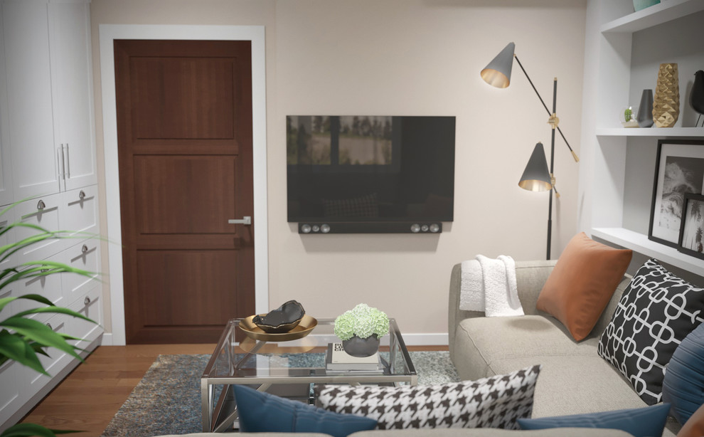Стильный дизайн: маленькая изолированная гостиная комната в скандинавском стиле с с книжными шкафами и полками, белыми стенами, полом из ламината, телевизором на стене и коричневым полом для на участке и в саду - последний тренд