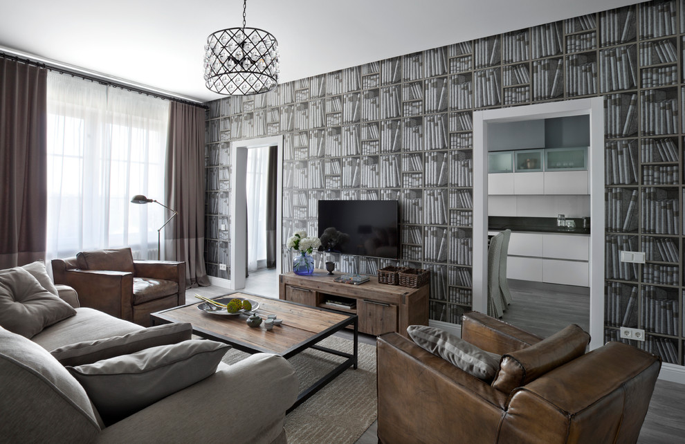 Пример оригинального дизайна: парадная, изолированная, объединенная гостиная комната в современном стиле с телевизором на стене и обоями за телевизором