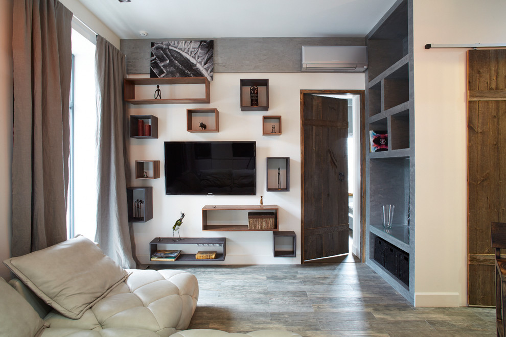 Ispirazione per un soggiorno industriale aperto con sala formale, pareti bianche e TV a parete