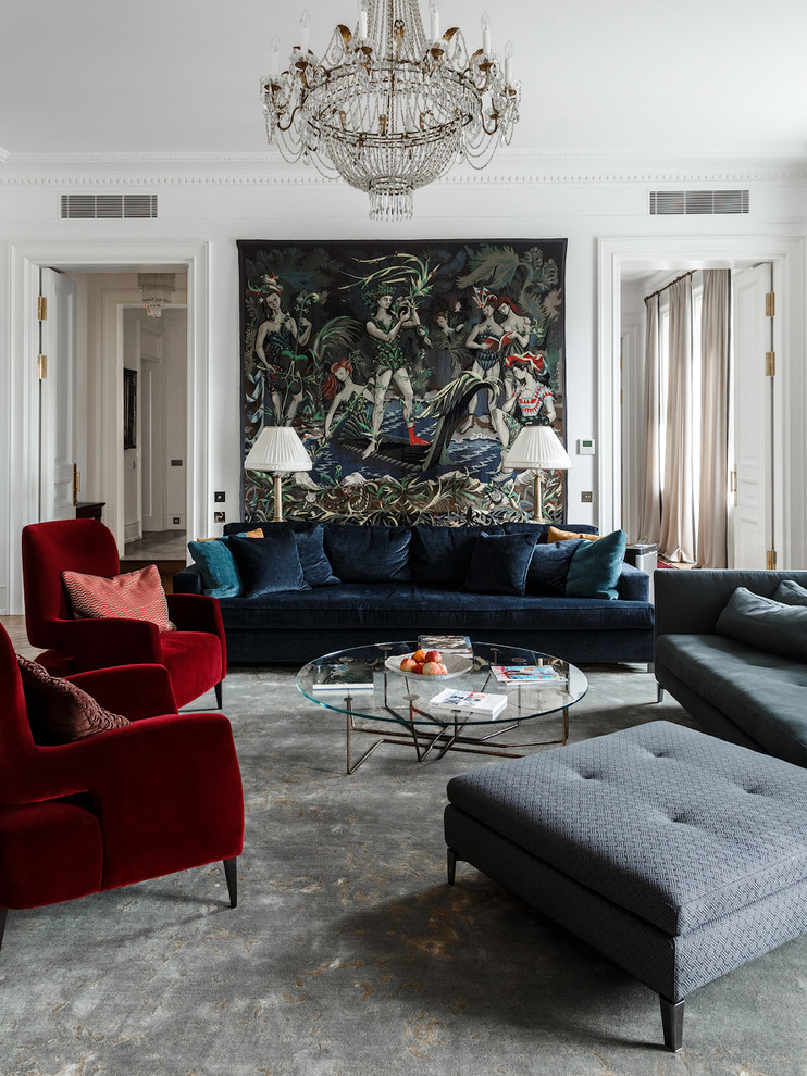 На фото: парадная гостиная комната в стиле неоклассика (современная классика) с ковровым покрытием, серым полом и бордовым диваном с