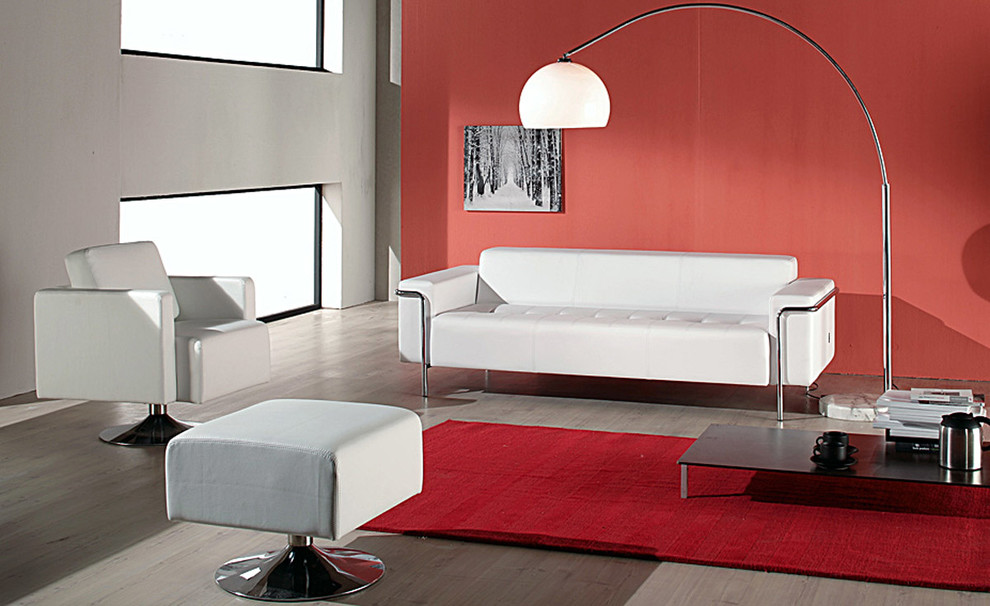 Foto di un soggiorno contemporaneo chiuso con pareti rosse e pavimento in laminato