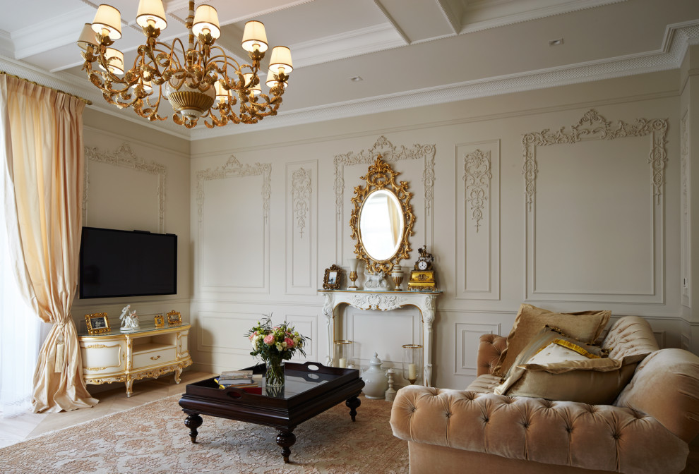 Esempio di un soggiorno vittoriano con pareti beige, TV a parete e pavimento beige