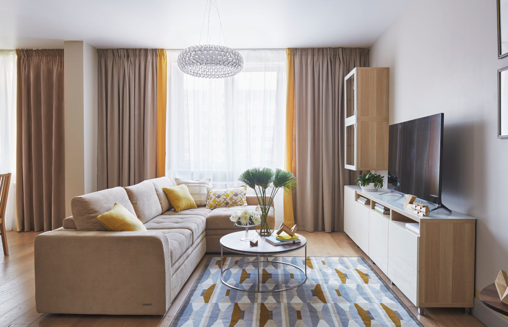 Idéer för ett modernt vardagsrum, med en fristående TV