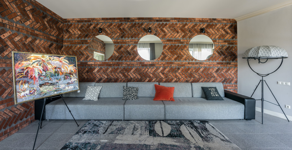 Inspiration pour un salon design avec un mur marron et un sol gris.