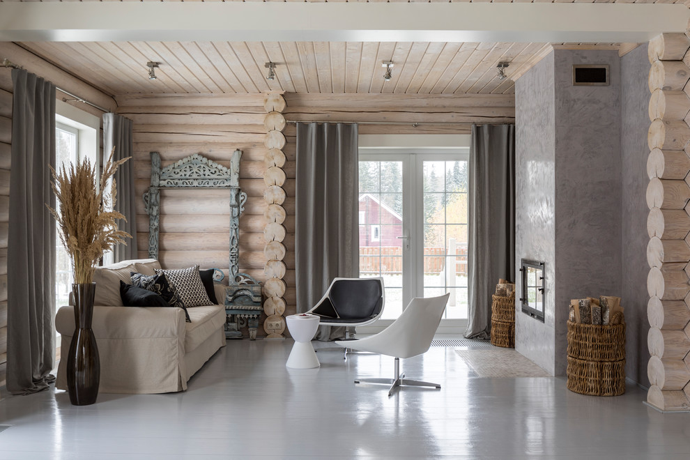 Foto de salón para visitas abierto contemporáneo de tamaño medio con paredes beige, suelo de madera pintada, marco de chimenea de yeso, suelo gris y chimenea lineal