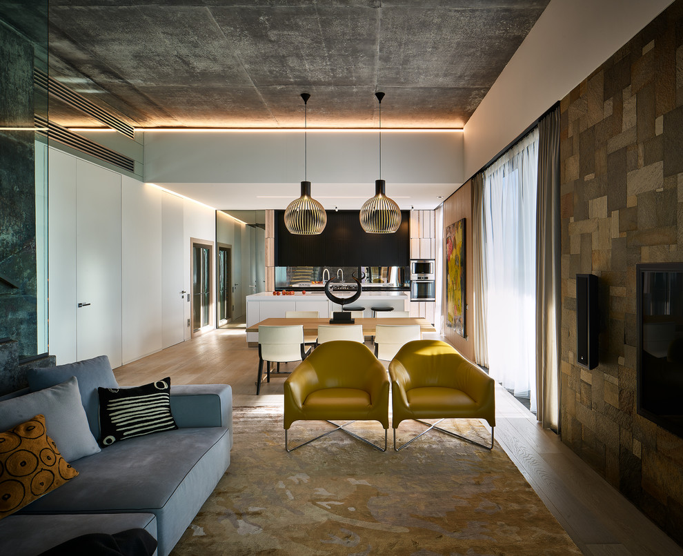 Стильный дизайн: открытая, объединенная гостиная комната среднего размера в современном стиле с белыми стенами - последний тренд