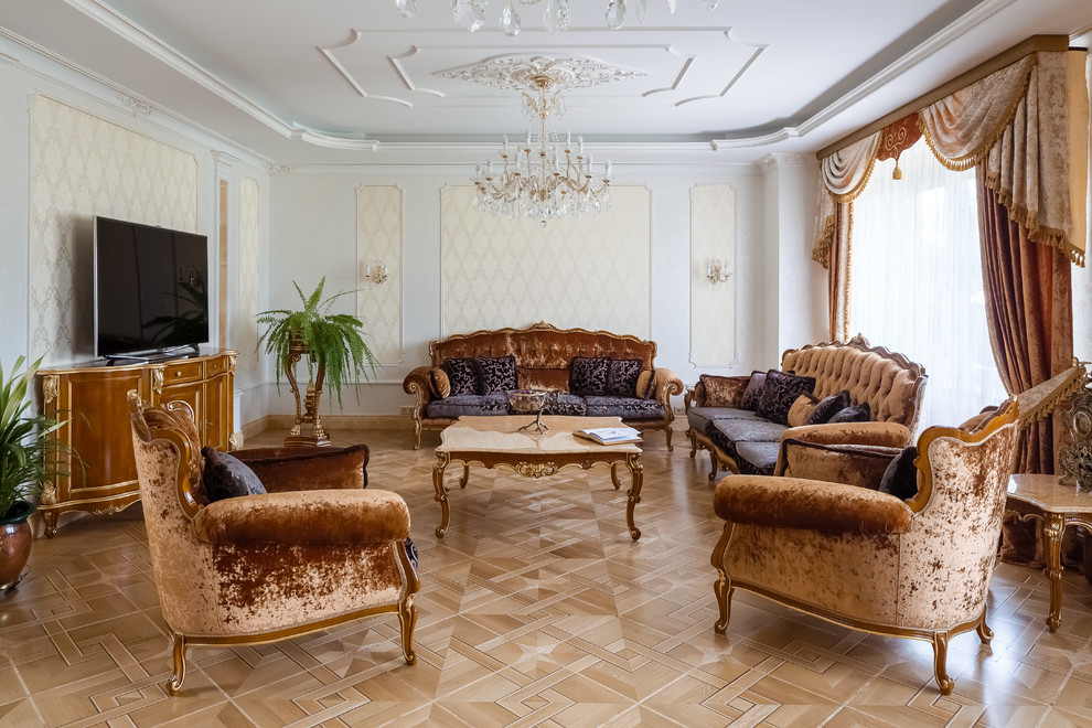 This is an example of a traditional formal living room in Moscow with beige walls and a freestanding tv.