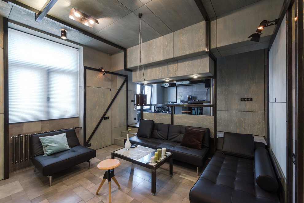 Idées déco pour un petit salon industriel ouvert avec une salle de réception, un sol en carrelage de céramique, un téléviseur fixé au mur, un sol gris et un mur gris.