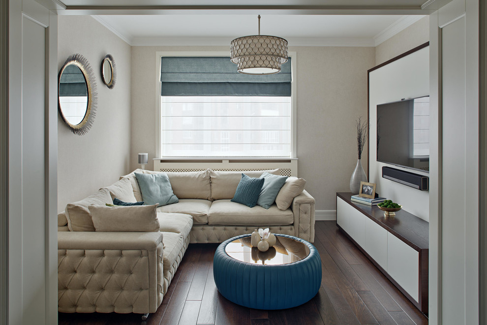 Photo of a classic enclosed living room in Moscow with beige walls, dark hardwood flooring and a wall mounted tv.