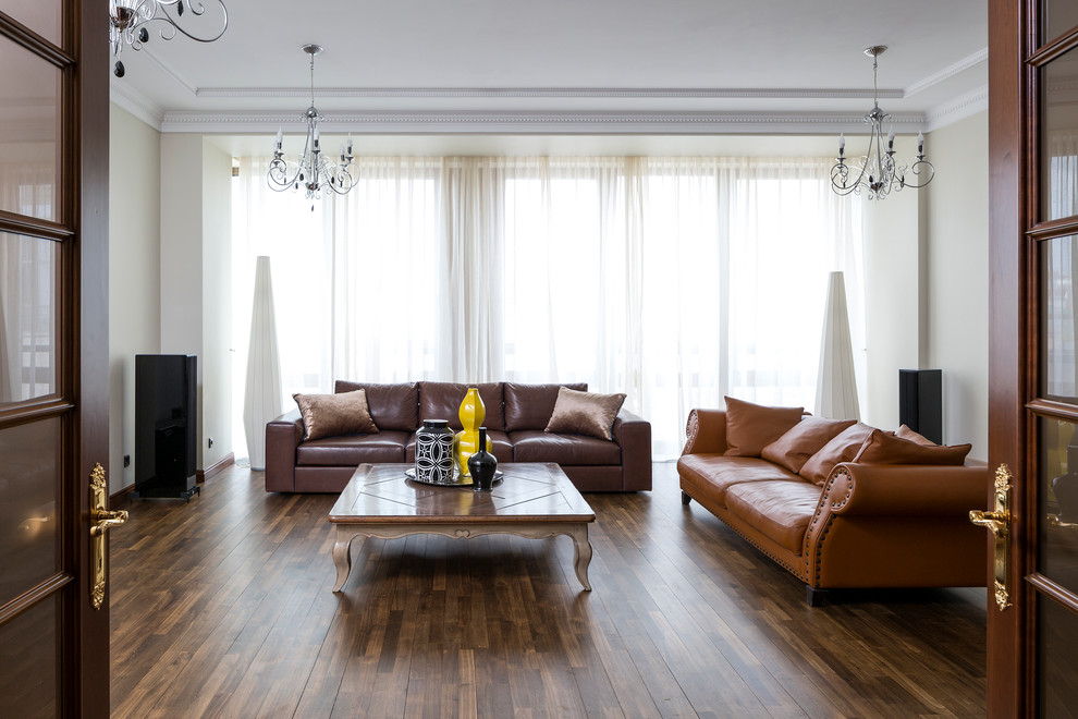 Design ideas for a large classic enclosed living room in Moscow with grey walls, dark hardwood flooring, no fireplace, a freestanding tv and brown floors.